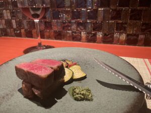 Beautifully plated Wagyu course dish at a Tokyo restaurant, representing what guests can expect after booking. 