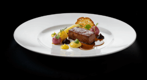 Elegant Wagyu course dish with artistic plating